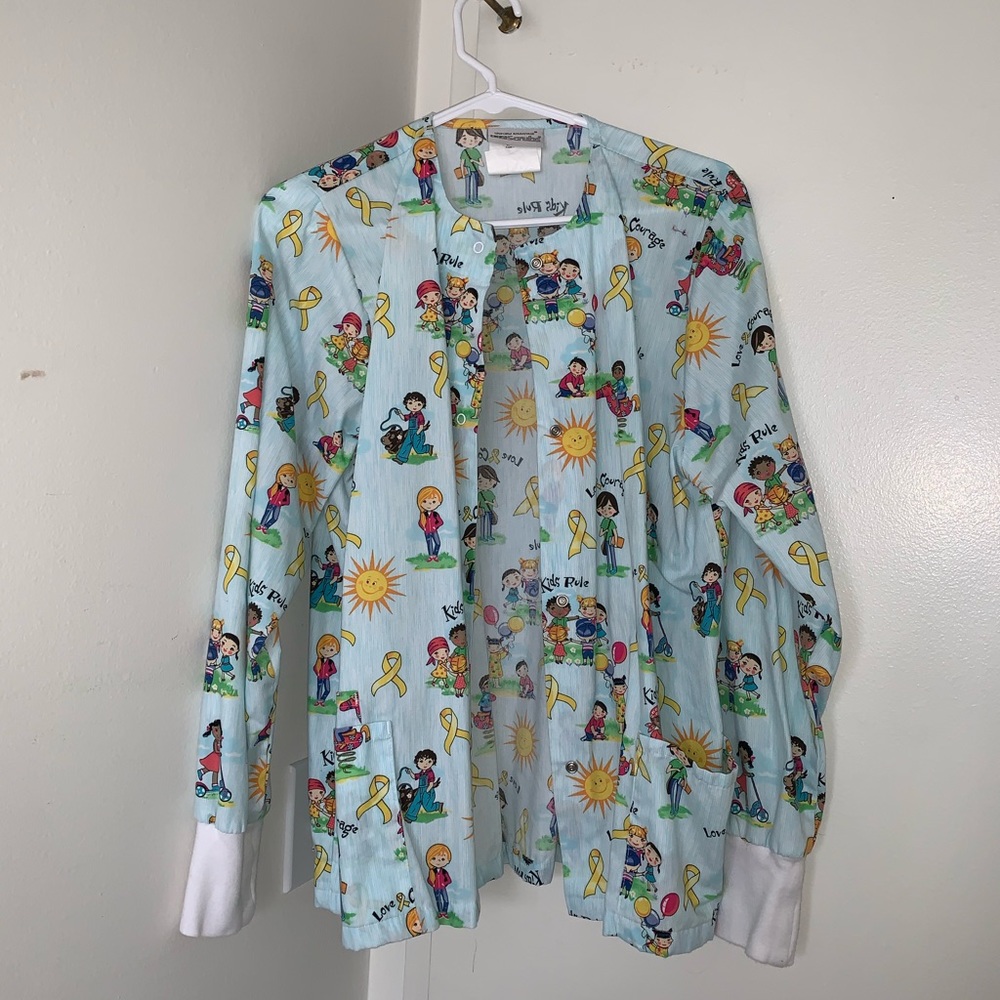 Pediatric cancer awareness scrub jacket